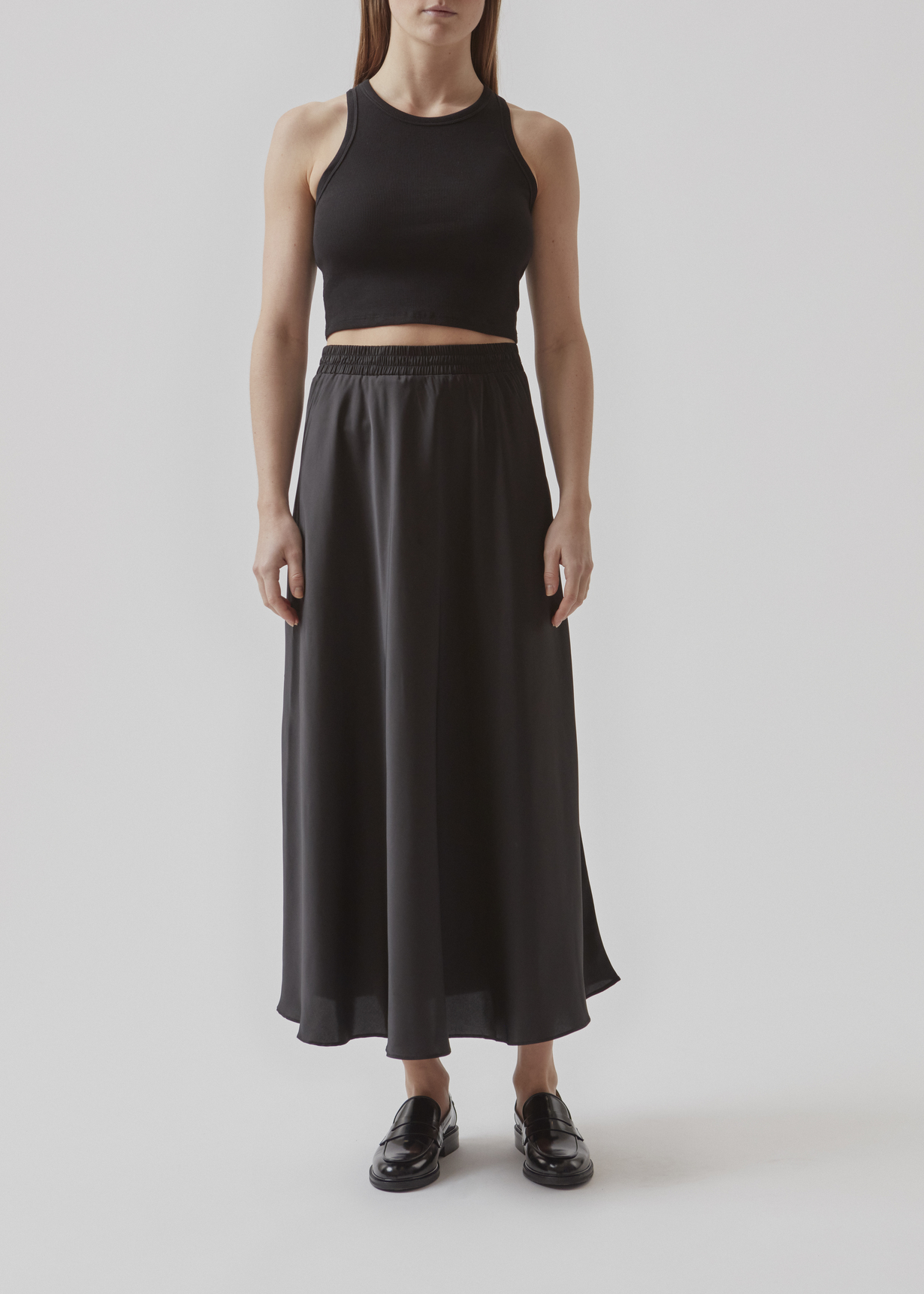 modstrom-reignmd-skirt-black-press-model-front.jpg